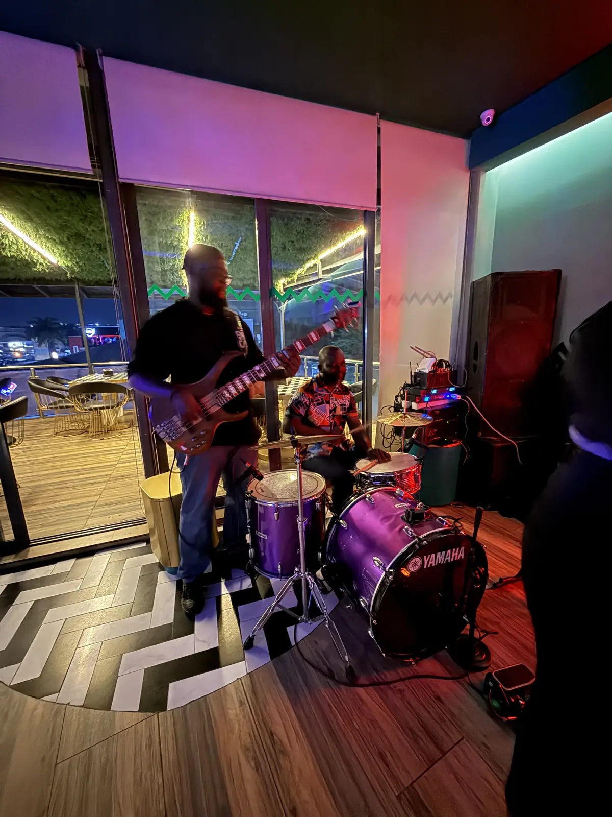 A Gineve Music band performing at a lounge event